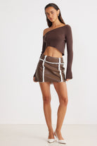 brown vegan leather  mini skirt with shearling detail