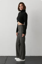 cropped black sweater , Brushed ribbed-knit sweater, Turtleneck,  Long Sleeves, Criss-Cross front hemline, Fit to bodice silhouette 