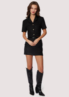 Woven boucle fabric
Fitted silhouette
Chic croc pleather accents at the waistline and pockets
Side pockets
Back zip closure
Mini length
black mini skirt
chanel inspired set 
matching set
skirt and top set