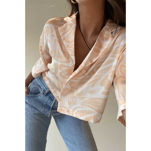 boxy crop top button down, swirl print, notched collar, dropped shoulder short sleeve.